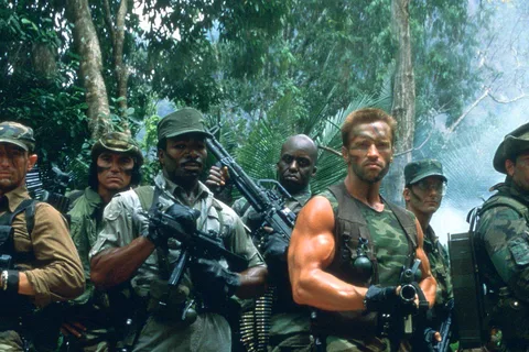 Dutch Schaefer and his rescue team armed in the jungle in Predator