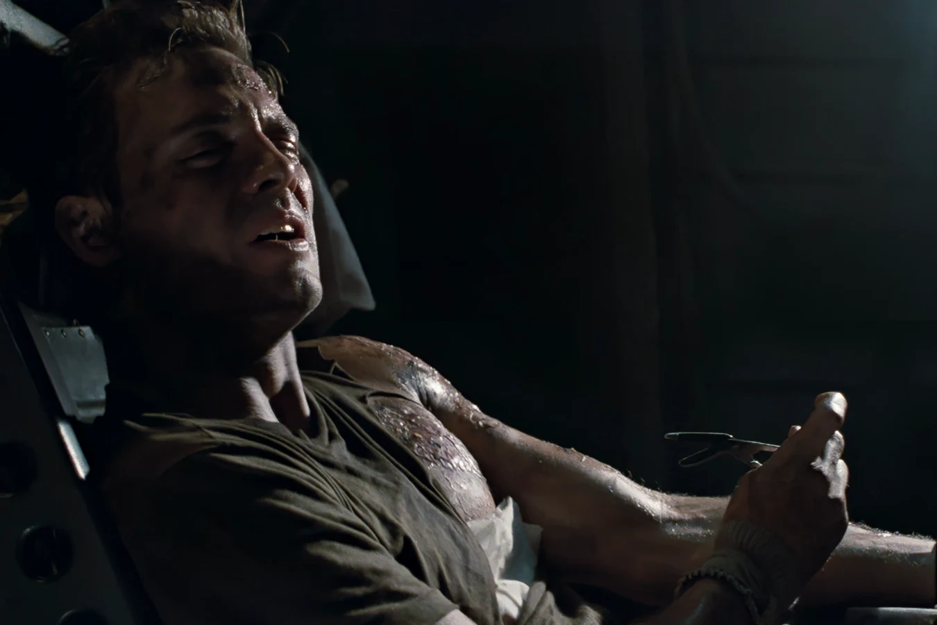 Hicks with acid burns after the elevator attack in Aliens