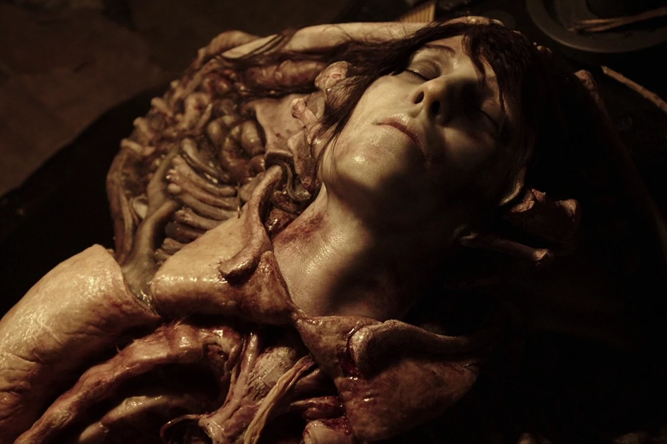 Elizabeth Shaw's dissected body on Planet 4, tubes and altered tissue across her torso