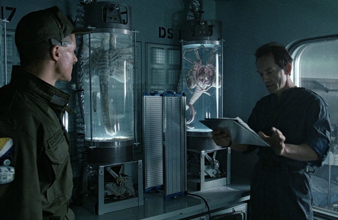 Bishop examining the facehugger removal report for John Marachuk
