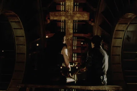 Ripley 8 and Annalee Call at Father's lit chapel interface on the USM Auriga