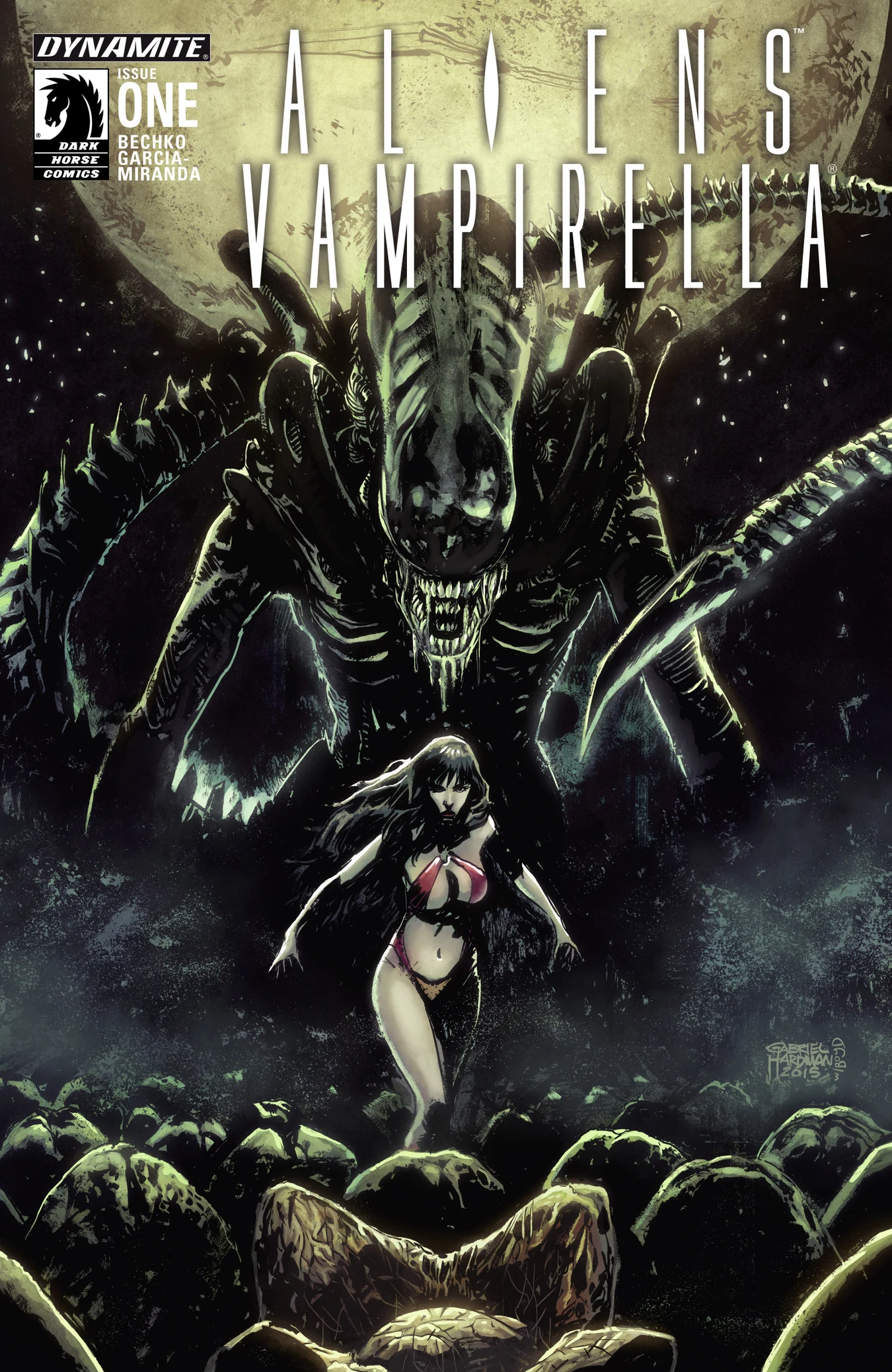 Gabriel Hardman's cover for Aliens/Vampirella #1, Vampirella walking through a field of Xenomorph eggs as a Xenomorph rises behind her in front of a pale moon