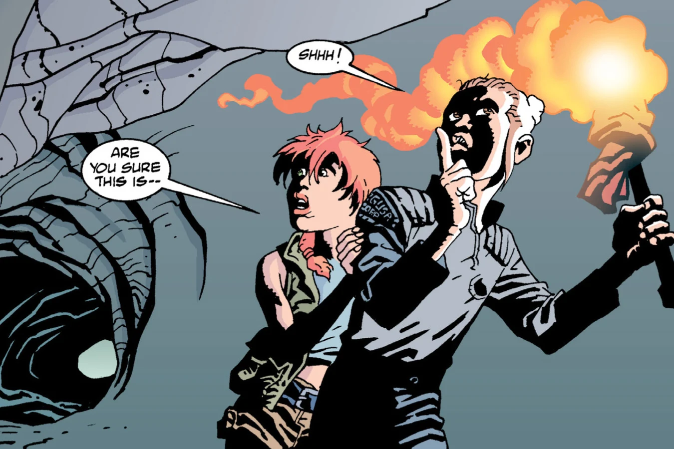 Roark and Hope carrying a torch through the tunnel in Aliens: Wraith