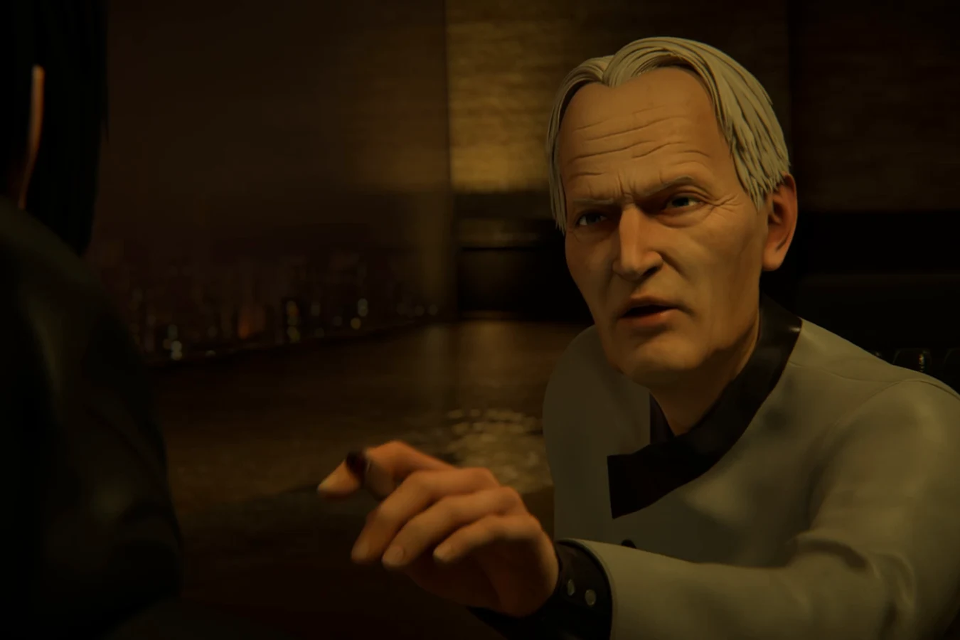 Niander Wallace Sr. pointing across his desk as he lectures his son in Blade Runner: Black Lotus