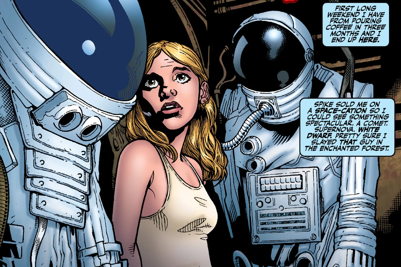 Buffy in a white tank top standing between two white spacesuits aboard Spike's ship