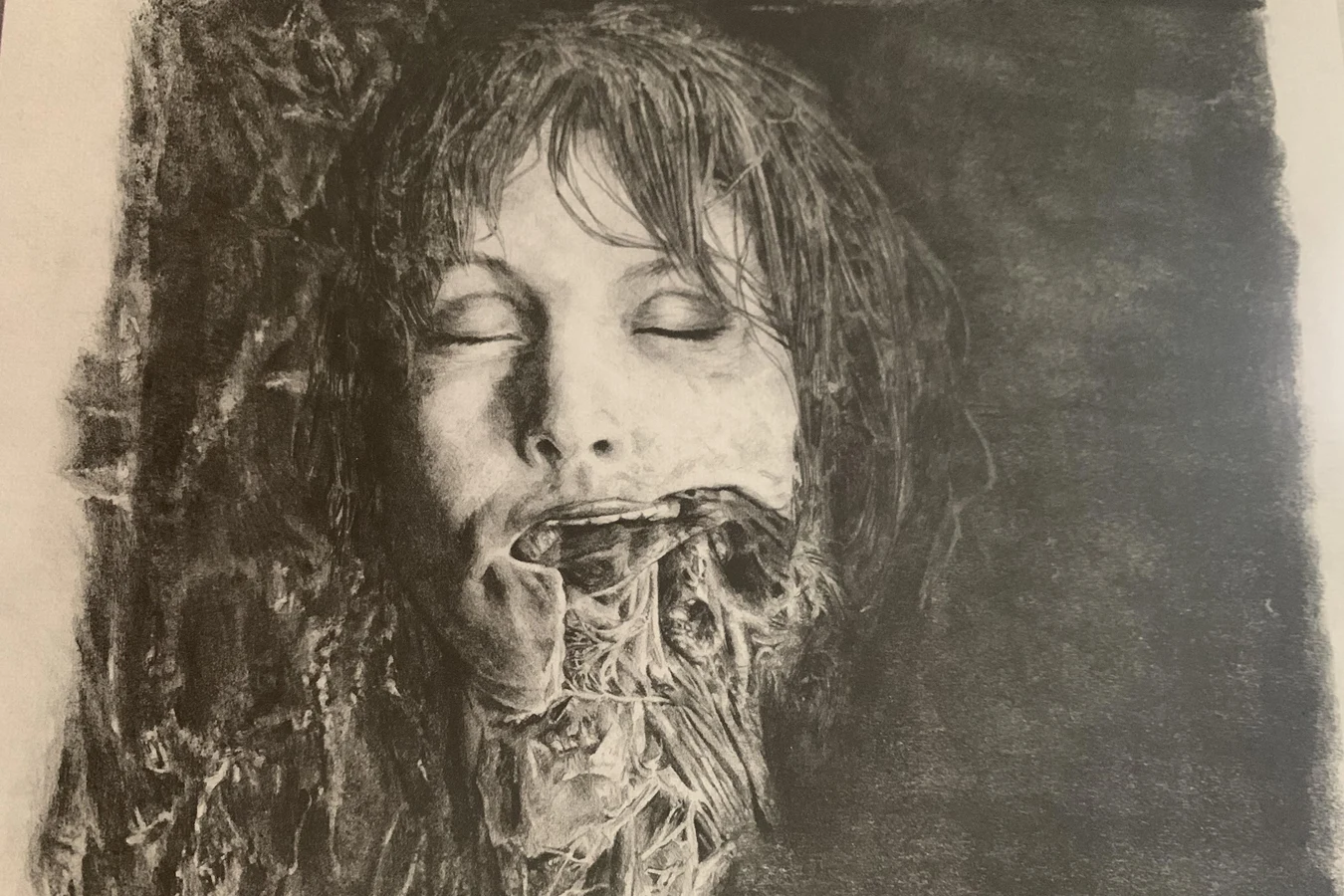 Elizabeth Shaw with her jaw and throat opened in a David's Drawings plate