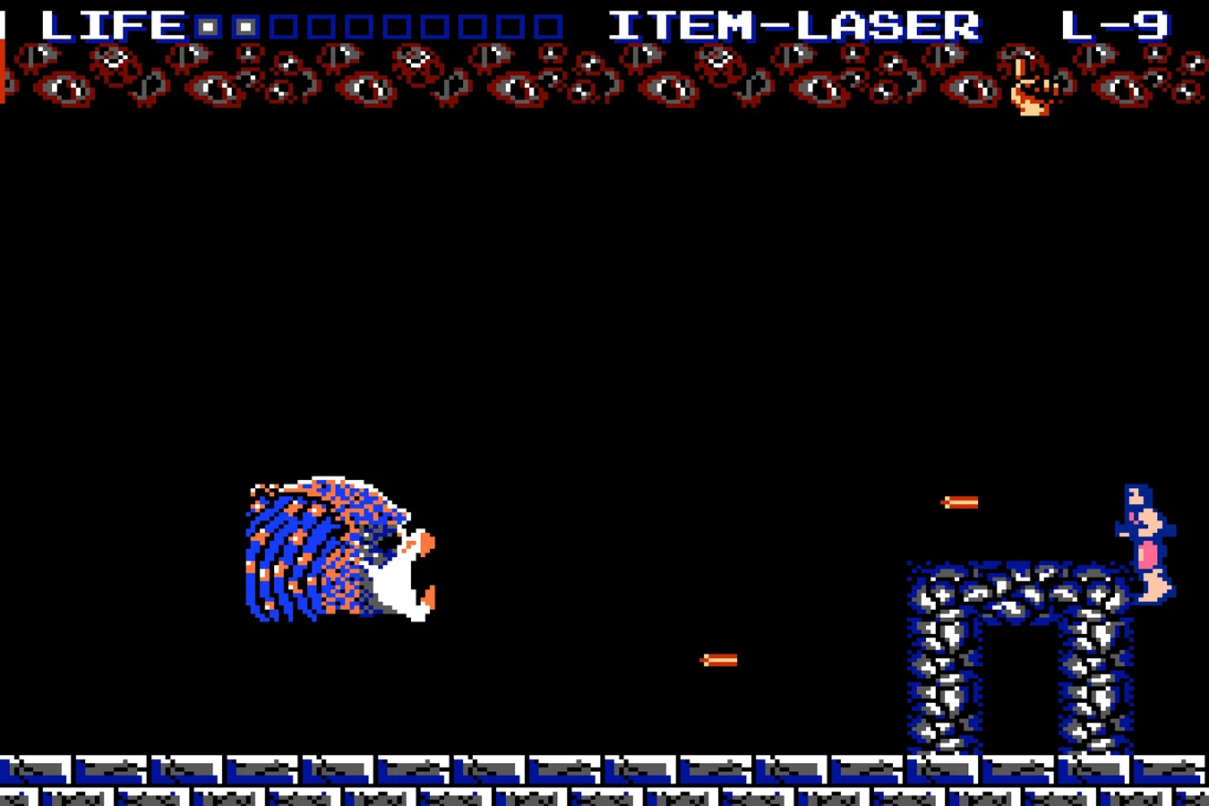 Dutch facing the Jungle Hunter's floating head in the 1988 NES Predator game