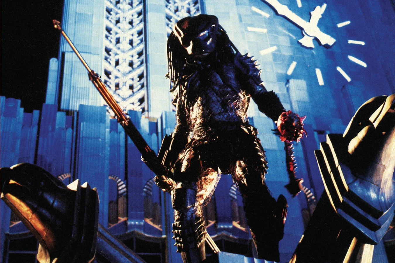 The photo cover of Predator 2 #2, with the Predator holding a spear and a skull on the clock tower of the Eastern Columbia Building