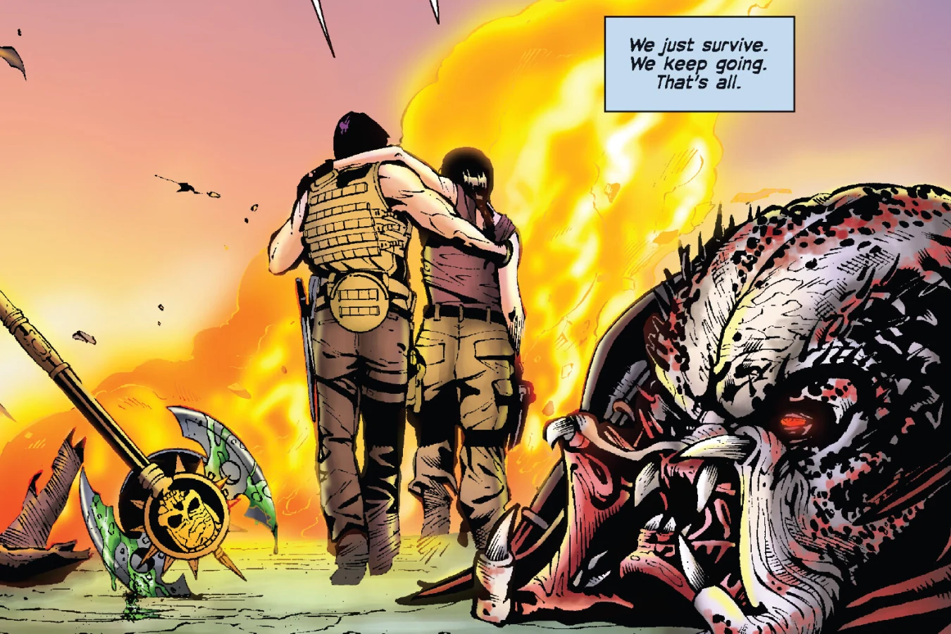 Royce and Isabelle walk away from a burning camp past a severed Predator head and a scavenged axe in Predators: Beating the Bullet