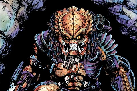 Chris Warner's cover for Predator: Big Game #1, with the Predator crouching in a cave mouth above a pile of skulls