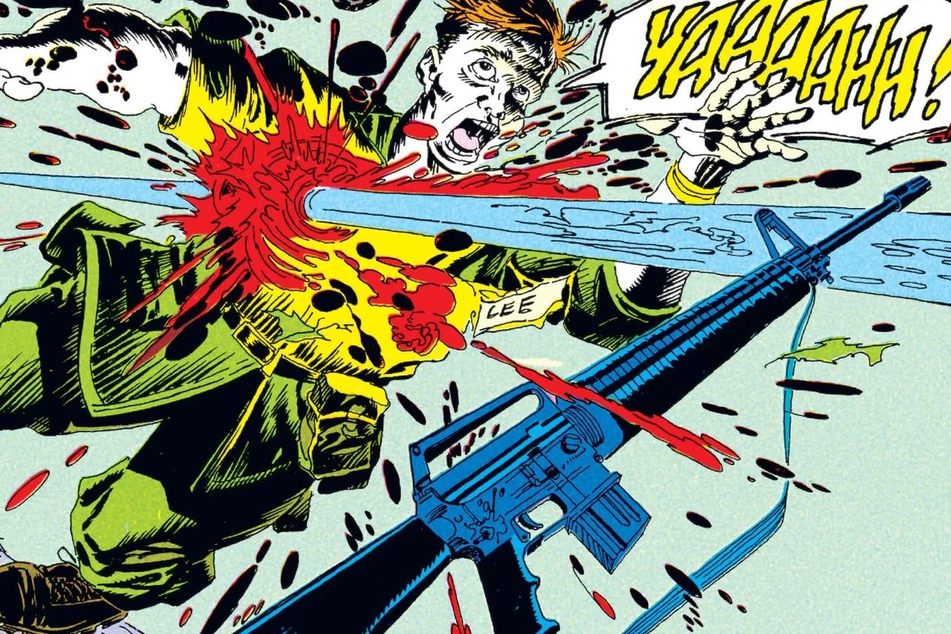 The Predator driving a spear through the fleeing soldier Lee in the hills near Cole Army Base in the Predator: Big Game comic