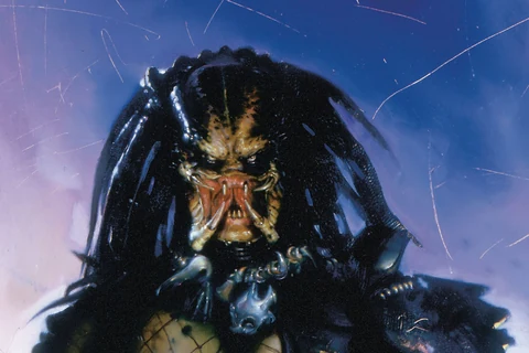 Dean Williams's painted cover for Predator: Captive, with an unmasked Predator facing the reader below the title logo