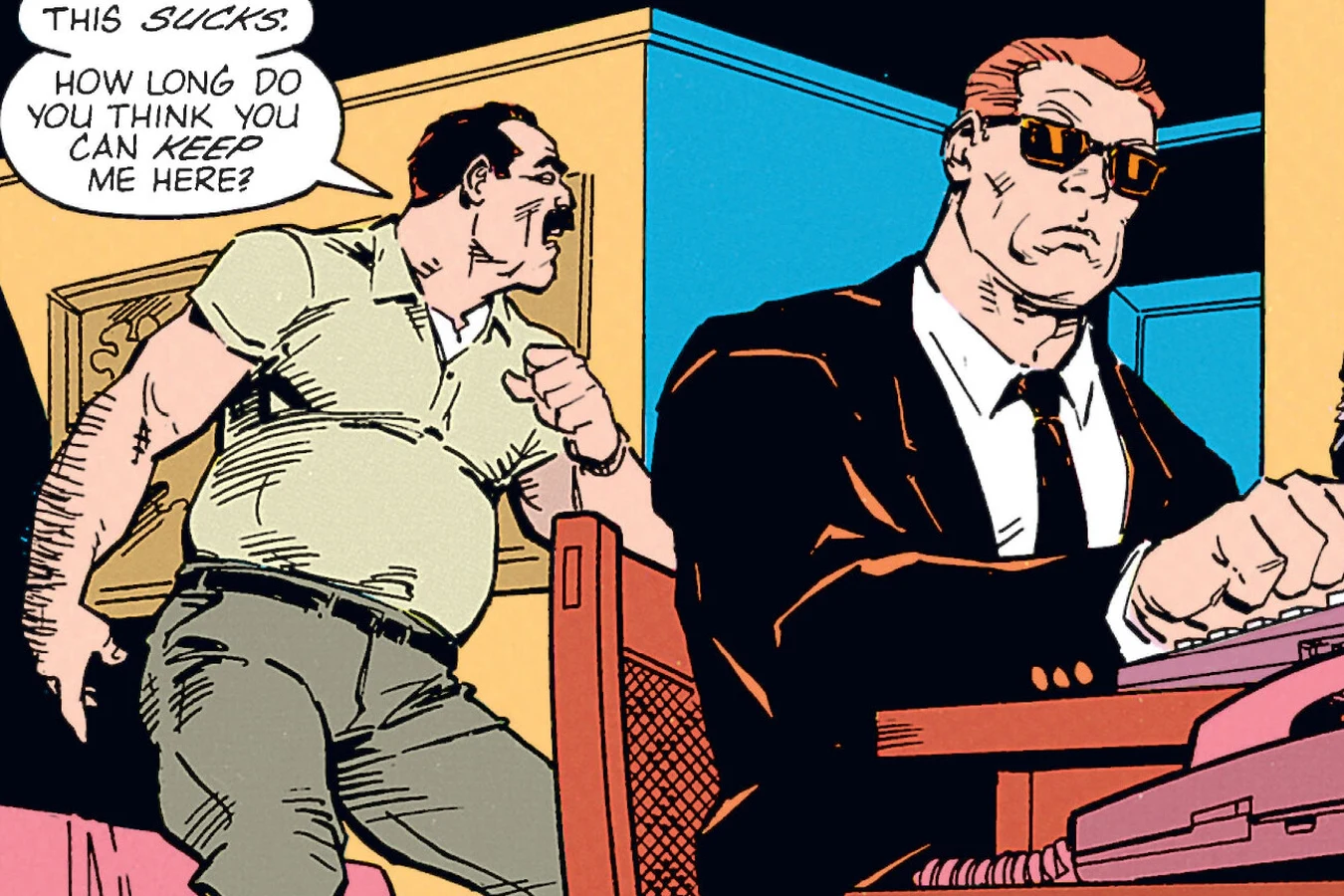 Rasche paces a hotel room while one of the general's agents in sunglasses works the telephone in Predator: Concrete Jungle