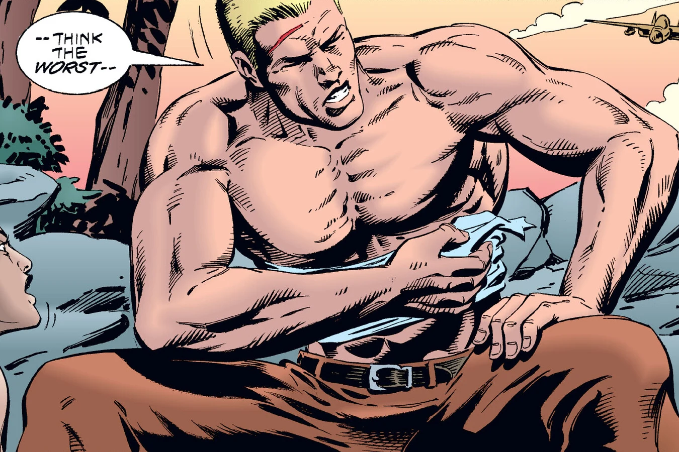 Schaefer bandaging the claw wounds on his shoulder after going over the falls in the Predator: Dark River comic