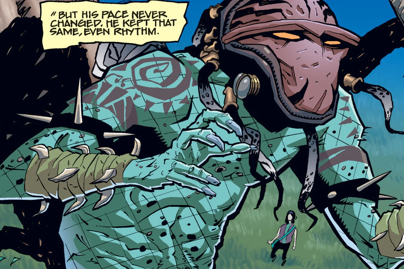 An elder Predator with spiral shoulder tattoos stalks through tall Yellowstone grass while Maya Bergstrom walks ahead in Predator: Homeworld