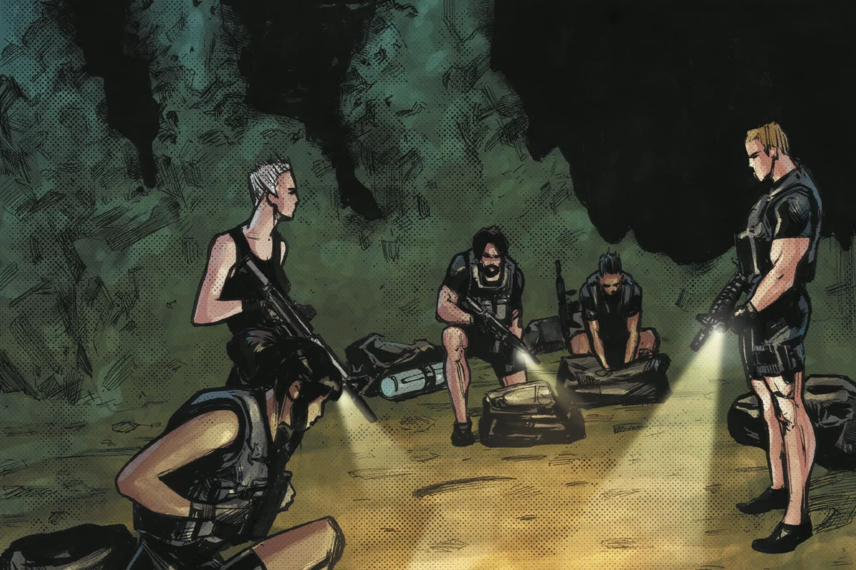 The hunters gear up by flashlight after surfacing in a cave in Predator: Hunters III