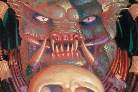 Igor Kordey's painting of a snarling Predator holding a human skull, from Predator: Kindred #1
