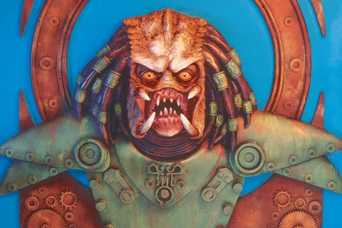 Tom Taggart's cover art for Predator: Nemesis #1, with a sculpted Predator bust in a Victorian circular mount