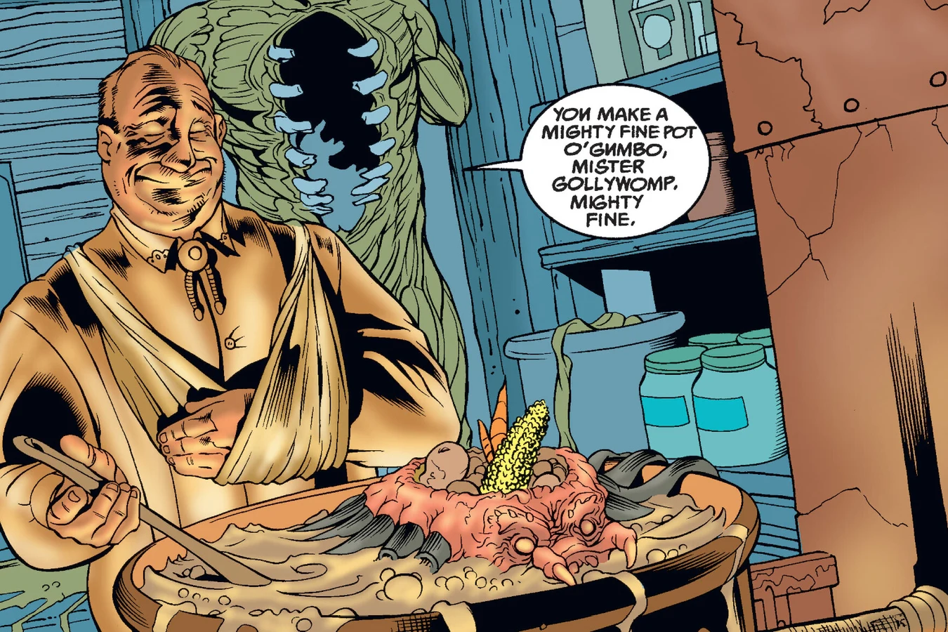 LeBlanc, his arm in a sling, stirring a pot of gumbo with the Predator's head in it while the creature's gutted body hangs behind him