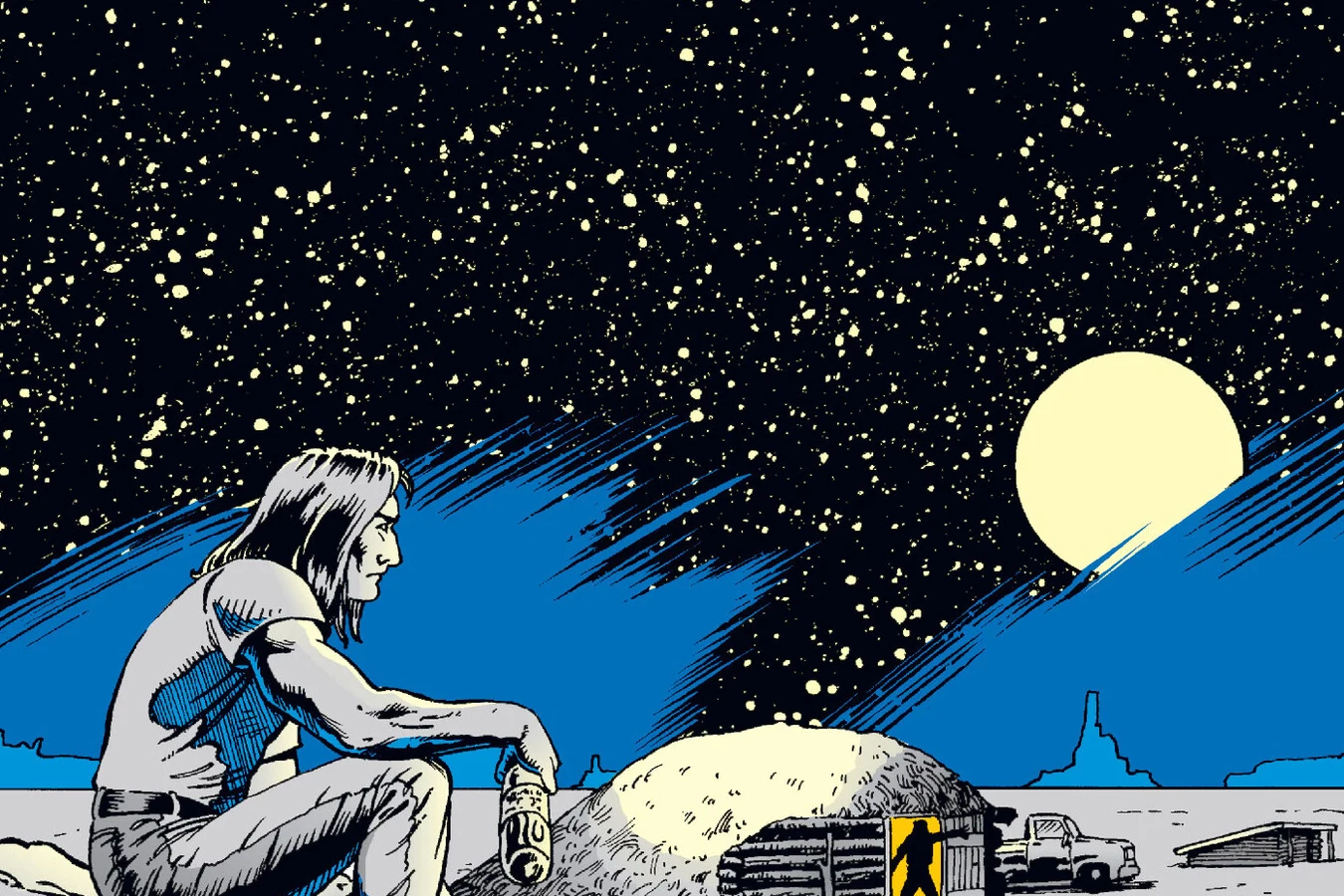 Enoch Nakai sits on a rock with a bottle under a full moon and a starry sky beside his grandfather's hogan in Predator: Blood on Two-Witch Mesa