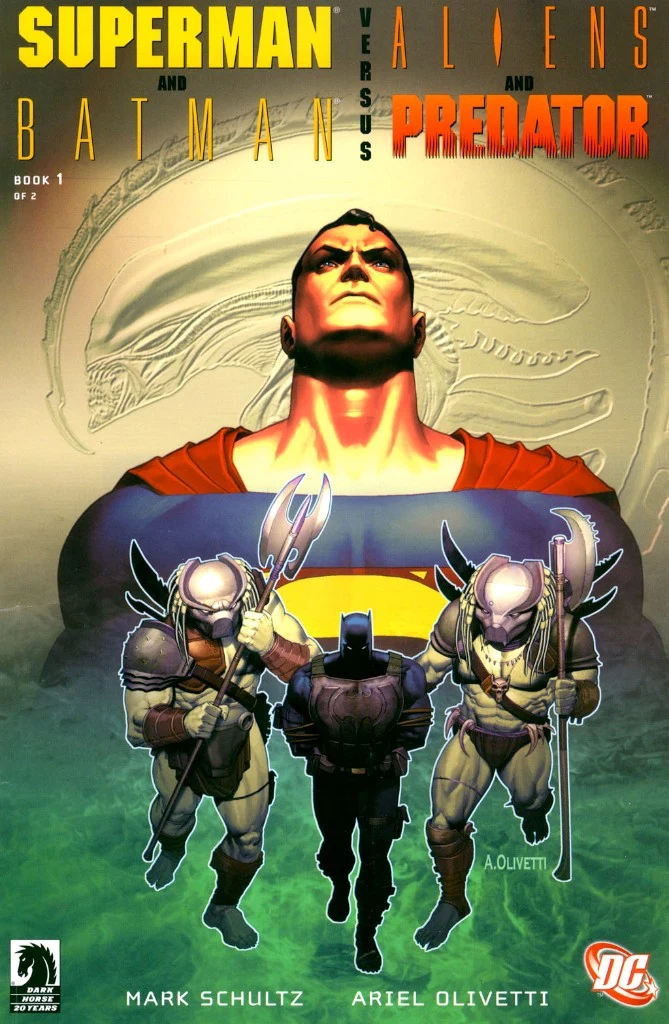 Cover of Superman and Batman vs. Aliens and Predator, with Superman, Batman, and two Predators