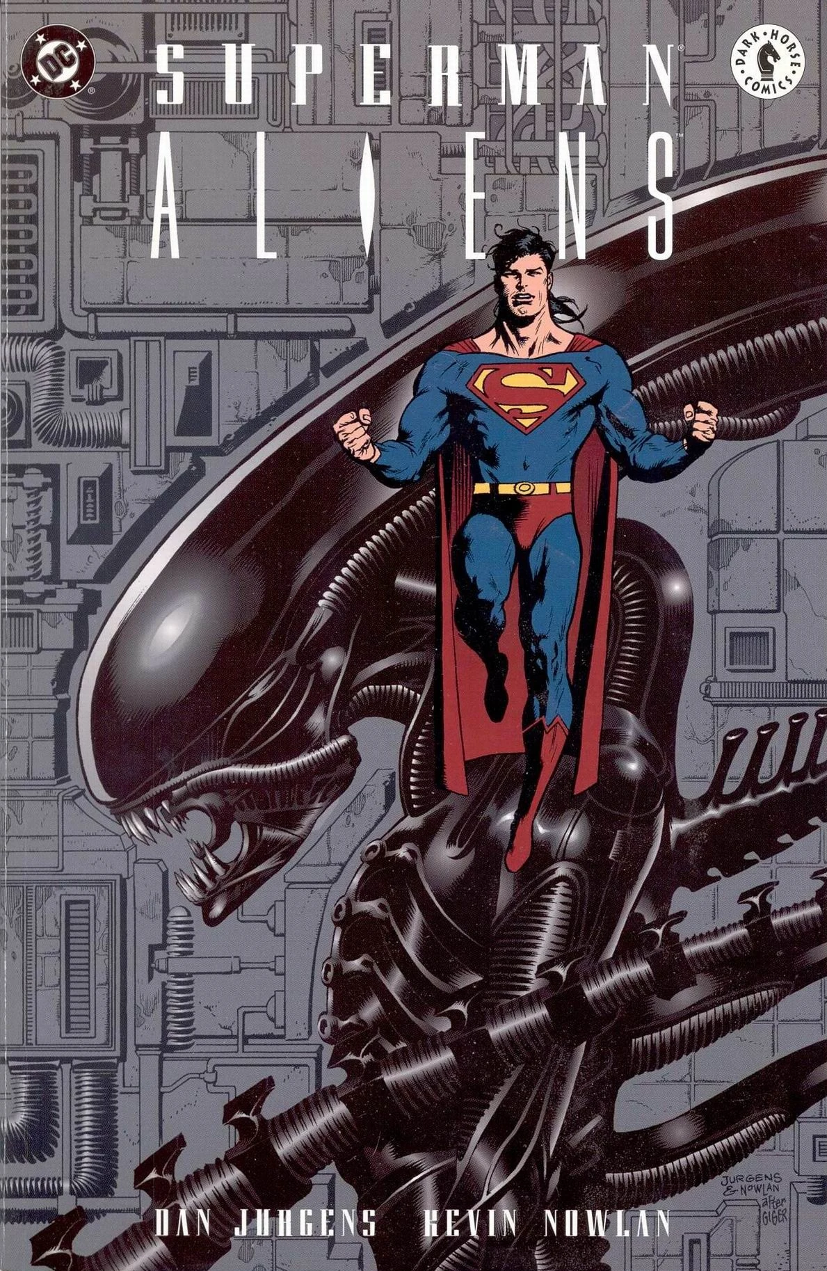 Dan Jurgens and Kevin Nowlan's cover for the Superman vs. Aliens trade paperback, Superman flying above a Xenomorph