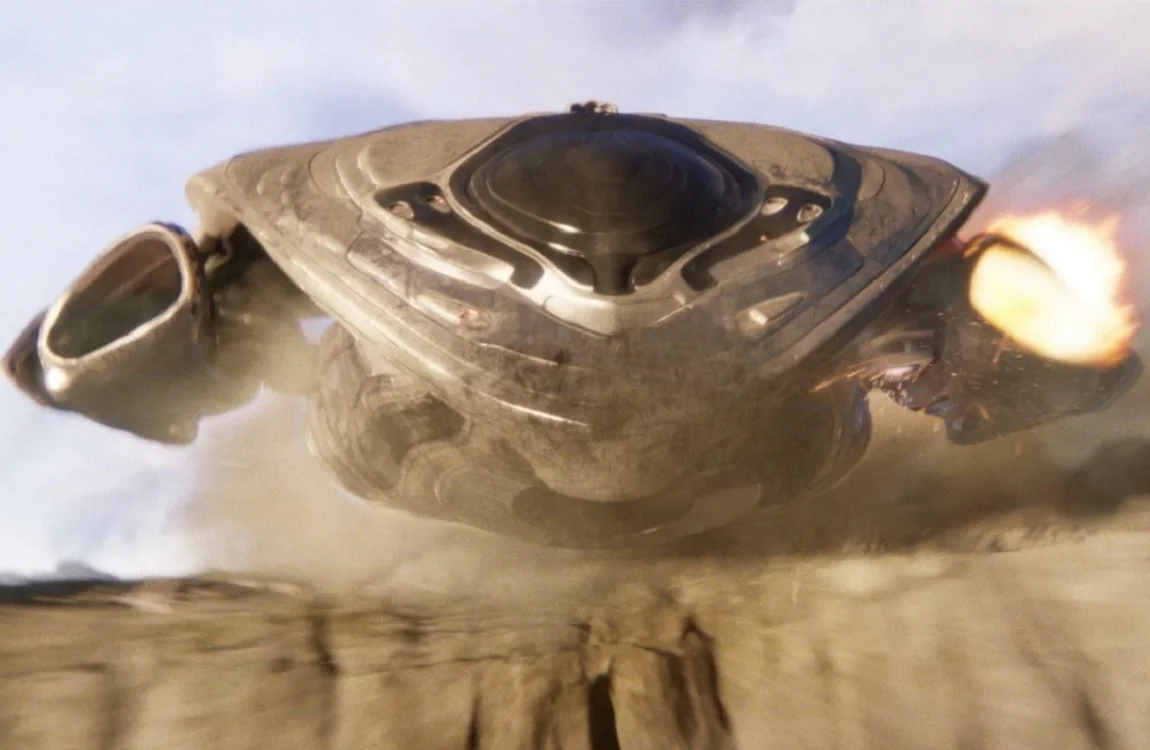 The Fugitive Predator's ship crash lands on Earth