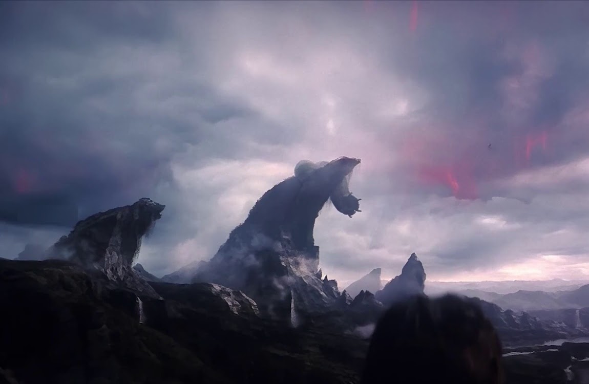 A Giant worm sits on top of a mountain