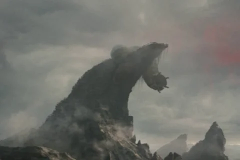 A giant worm biting a mountain in Predator: Badlands