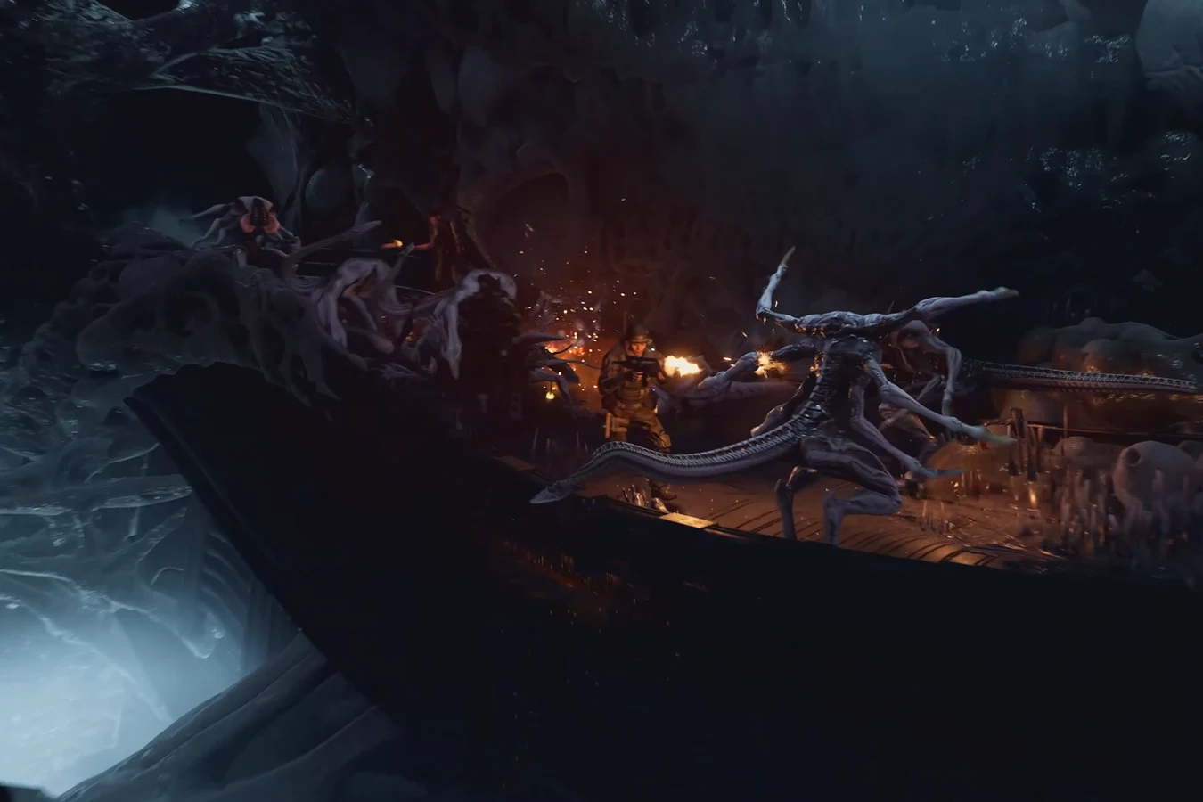 Harbingers closing from both sides on Colonial Marines in a hive corridor in Aliens Fireteam Elite 2