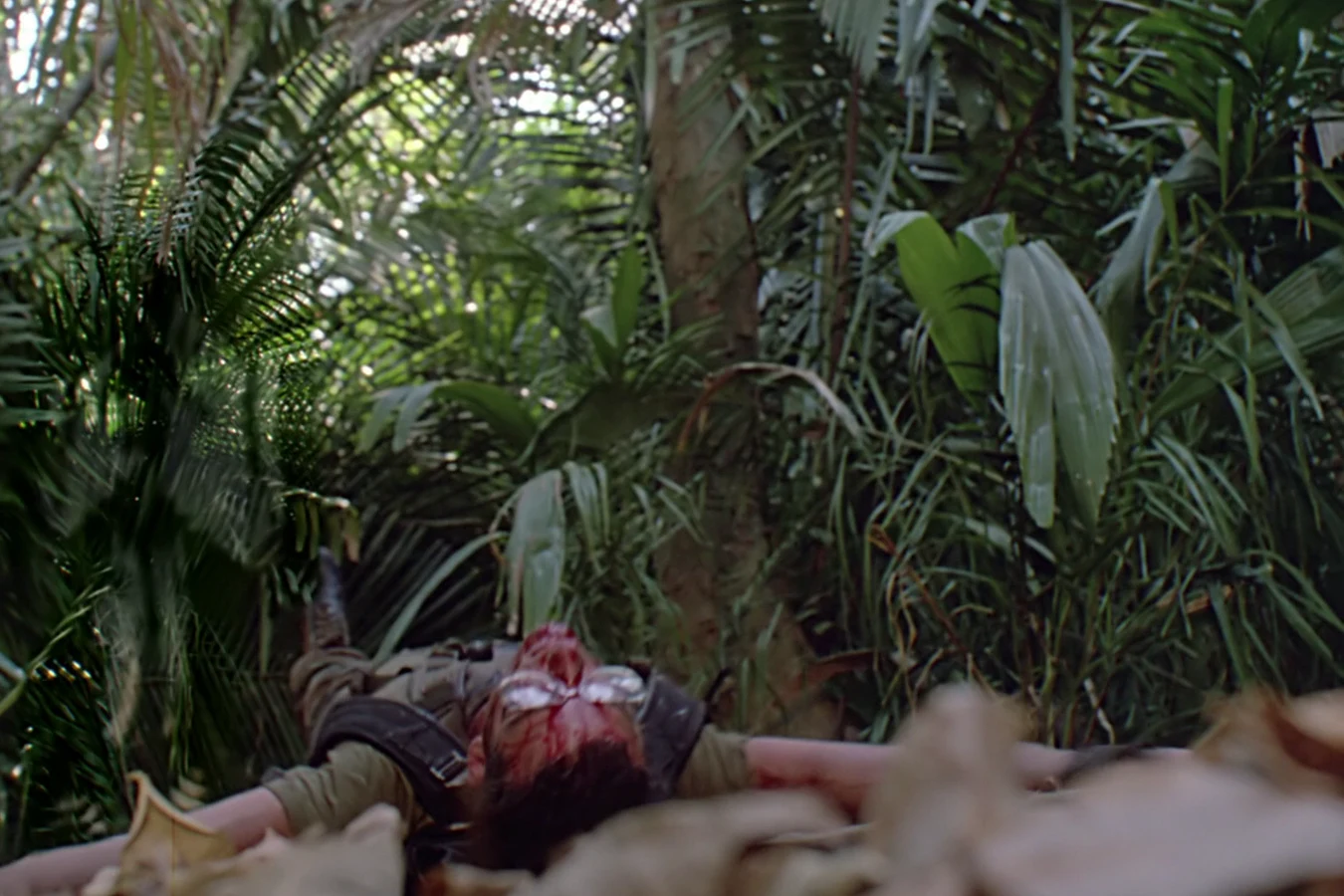 Rick Hawkins lying dead in the undergrowth after the Jungle Hunter's attack in Predator