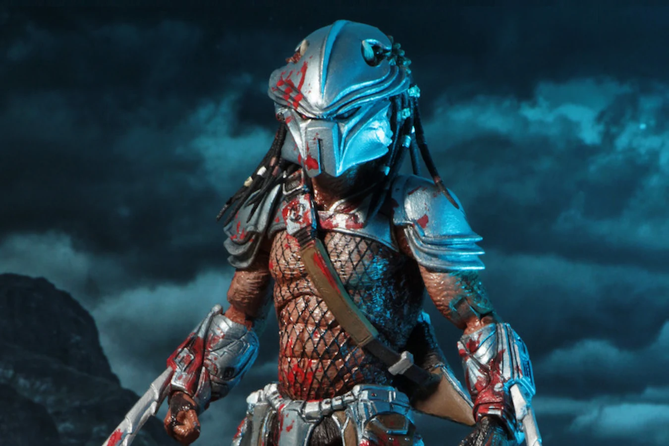 NECA Predator Series 18 Hornhead action figure with silver horned mask, blood-splattered armor and wristblades
