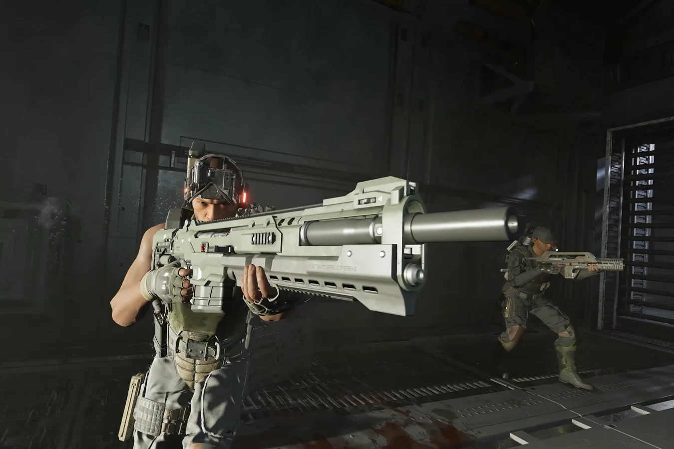 Hunter aiming a railgun down a corridor with a teammate nearby