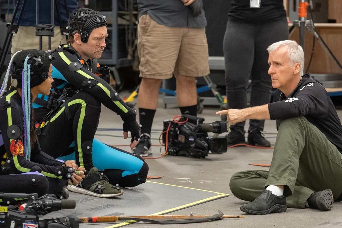 James Cameron directing Sam Worthington and Zoe Saldana in marker suits on the Avatar performance-capture volume