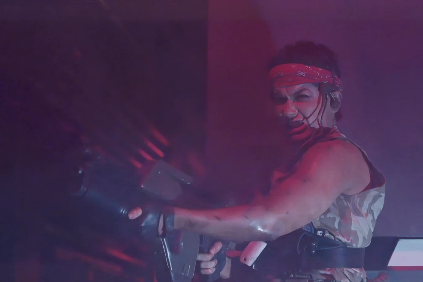 Vasquez firing a pistol in the Hadley's Hope vents during her last stand in Aliens