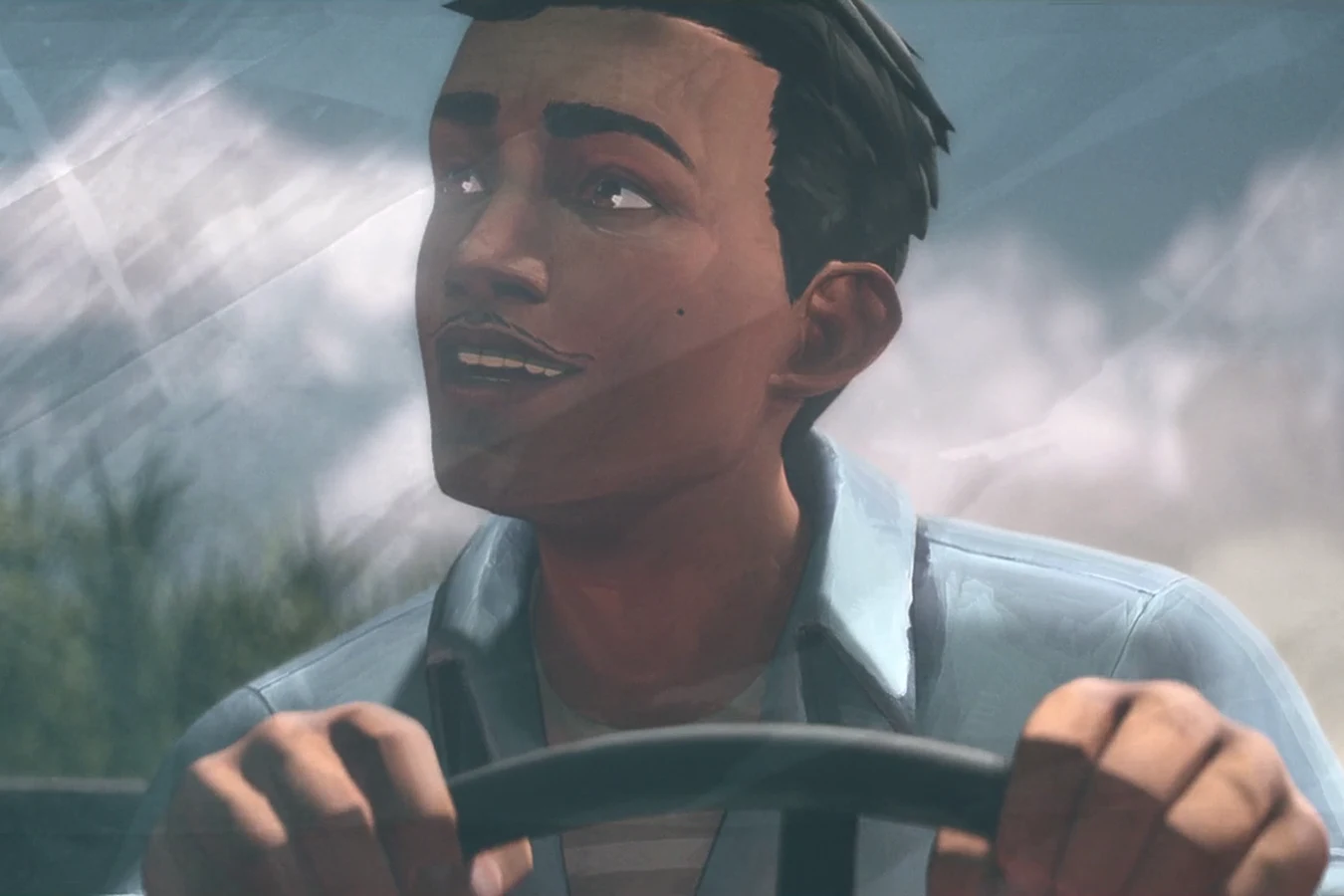 Young John Torres at the wheel of a car, looking up through the windshield