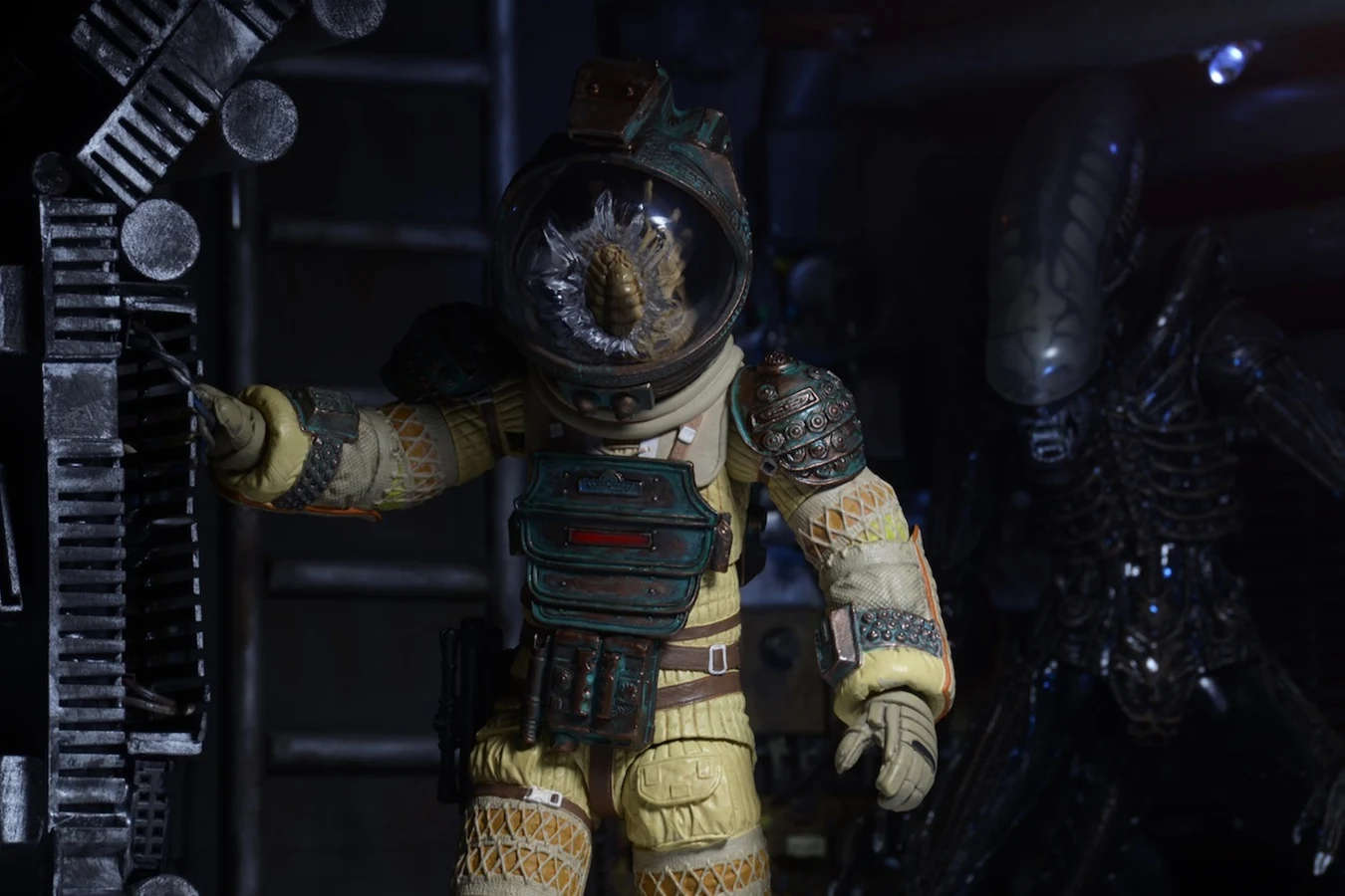 NECA Alien 40th Anniversary 7-inch Kane in a spacesuit with a Facehugger inside the helmet
