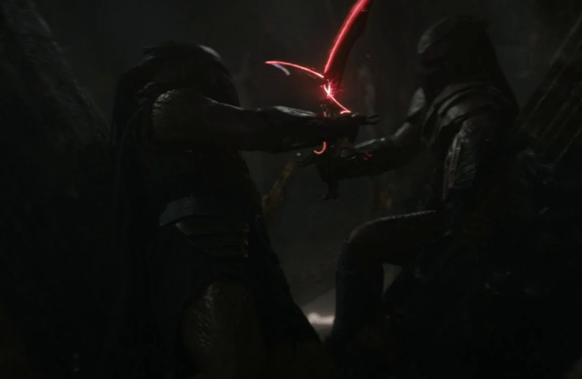 Dek and Kwei involved in a combat ritual