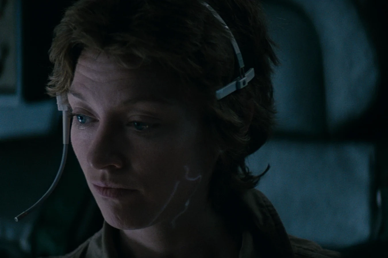 Close-up of Lambert with a headset in Alien