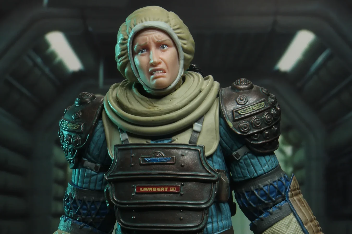 NECA 7-inch Lambert in a compression suit with a LAMBERT nameplate on the chest