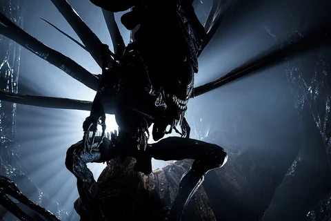 Xenomorph warriors inside a massive resin hive