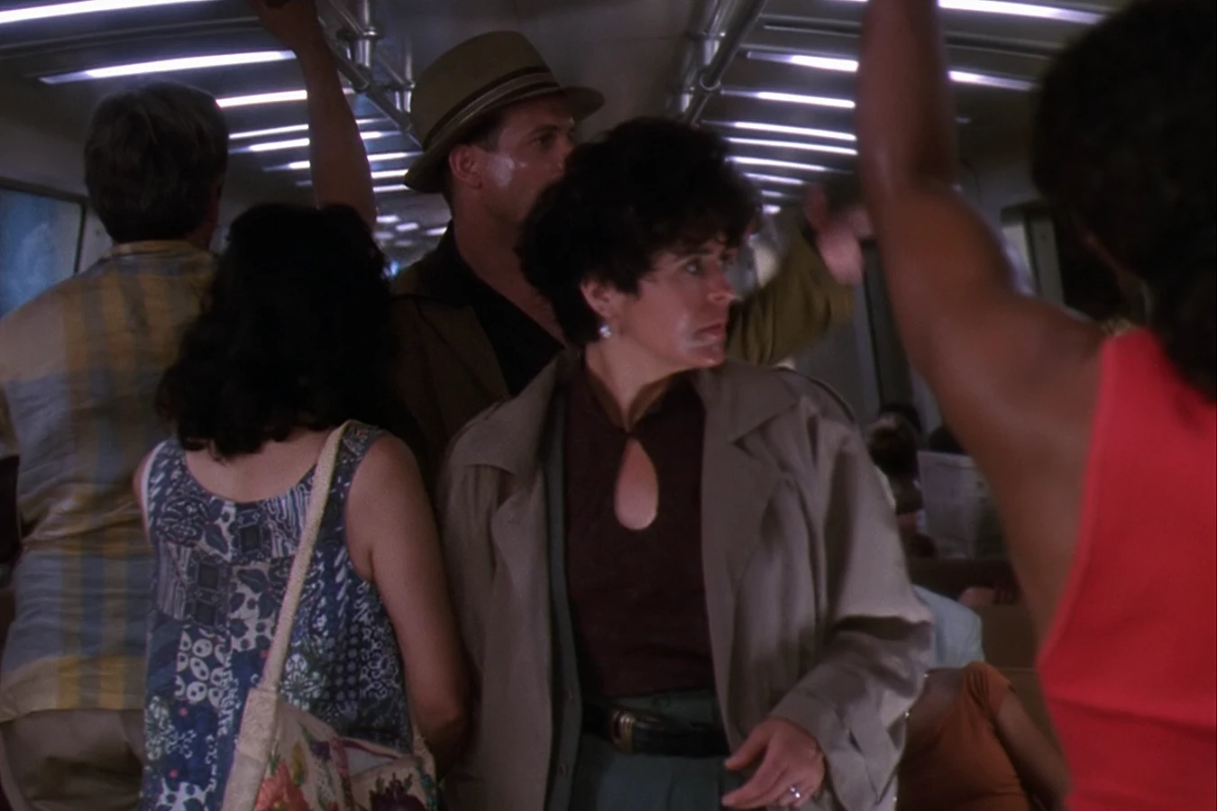 Detective Leona Cantrell in a crowded subway car in Predator 2
