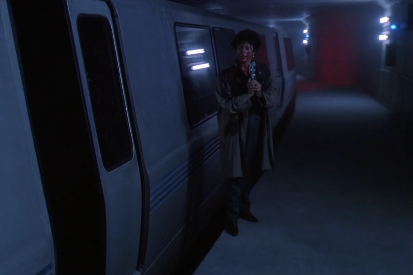 Leona Cantrell and Jerry Lambert on a Los Angeles subway platform in Predator 2