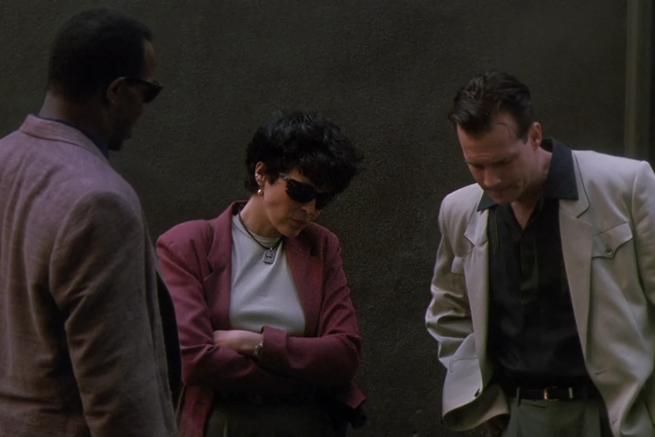 Detective Leona Cantrell outdoors in sunglasses during Predator 2