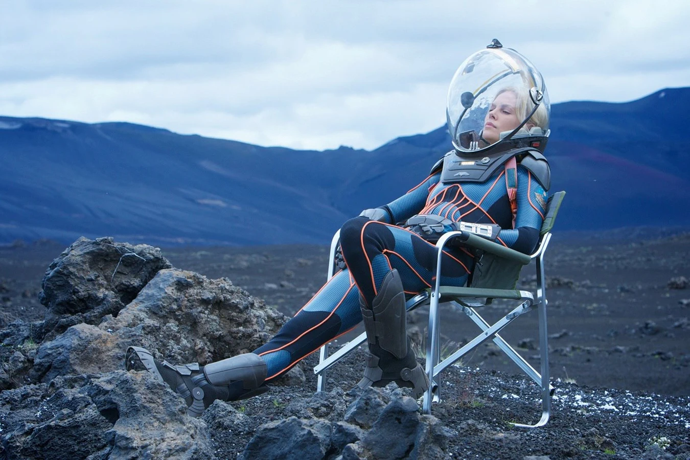 Charlize Theron as Meredith Vickers resting on the Iceland volcanic set used for LV-223 in Prometheus