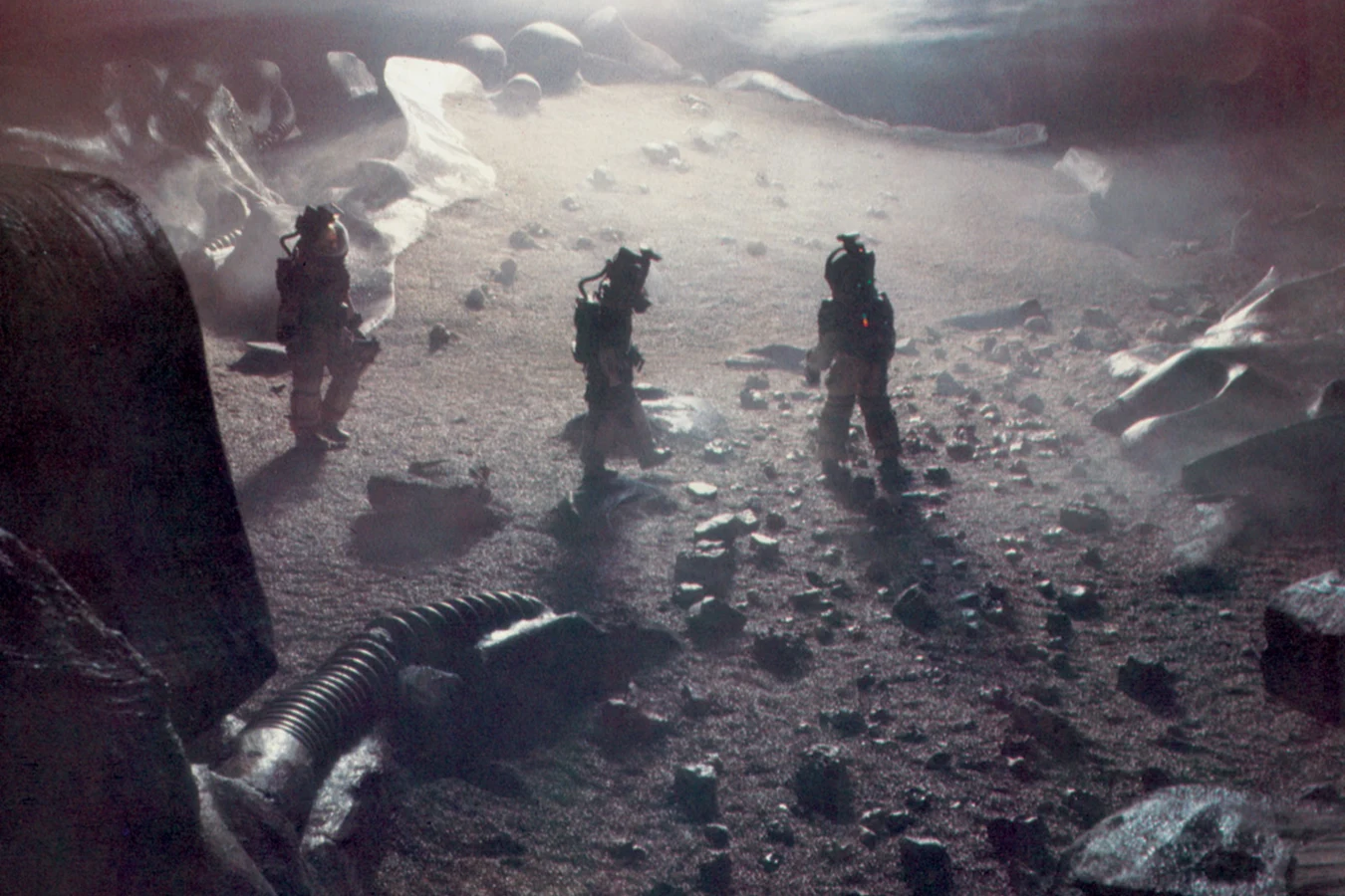 Spacesuited figures on the foggy LV-426 derelict surface set from Alien at Shepperton Studios
