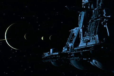 The Nostromo approaching LV-426 after detaching from the refinery