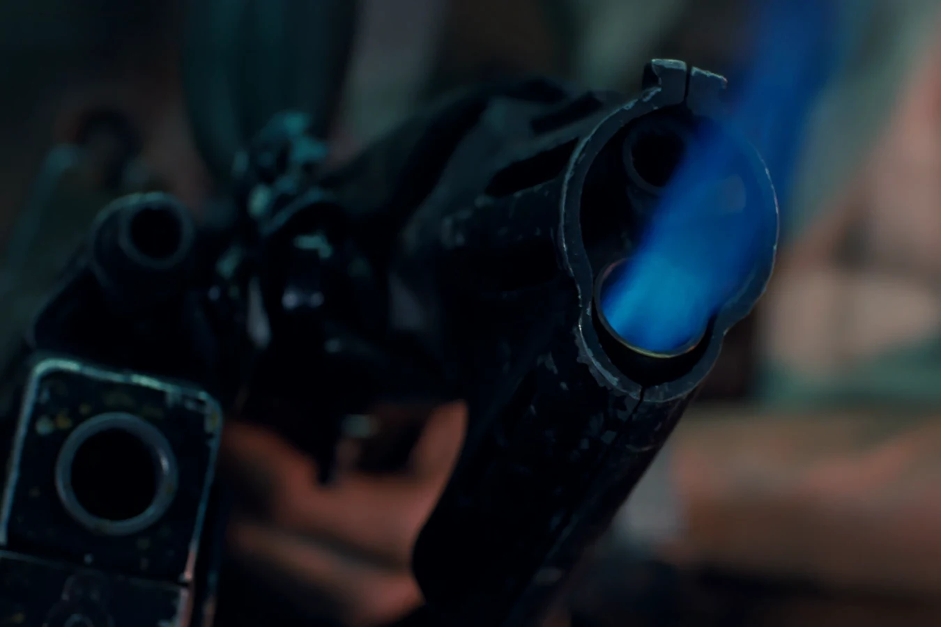Close-up of the M240 flamethrower muzzle with the blue nozzle-burner pilot light lit