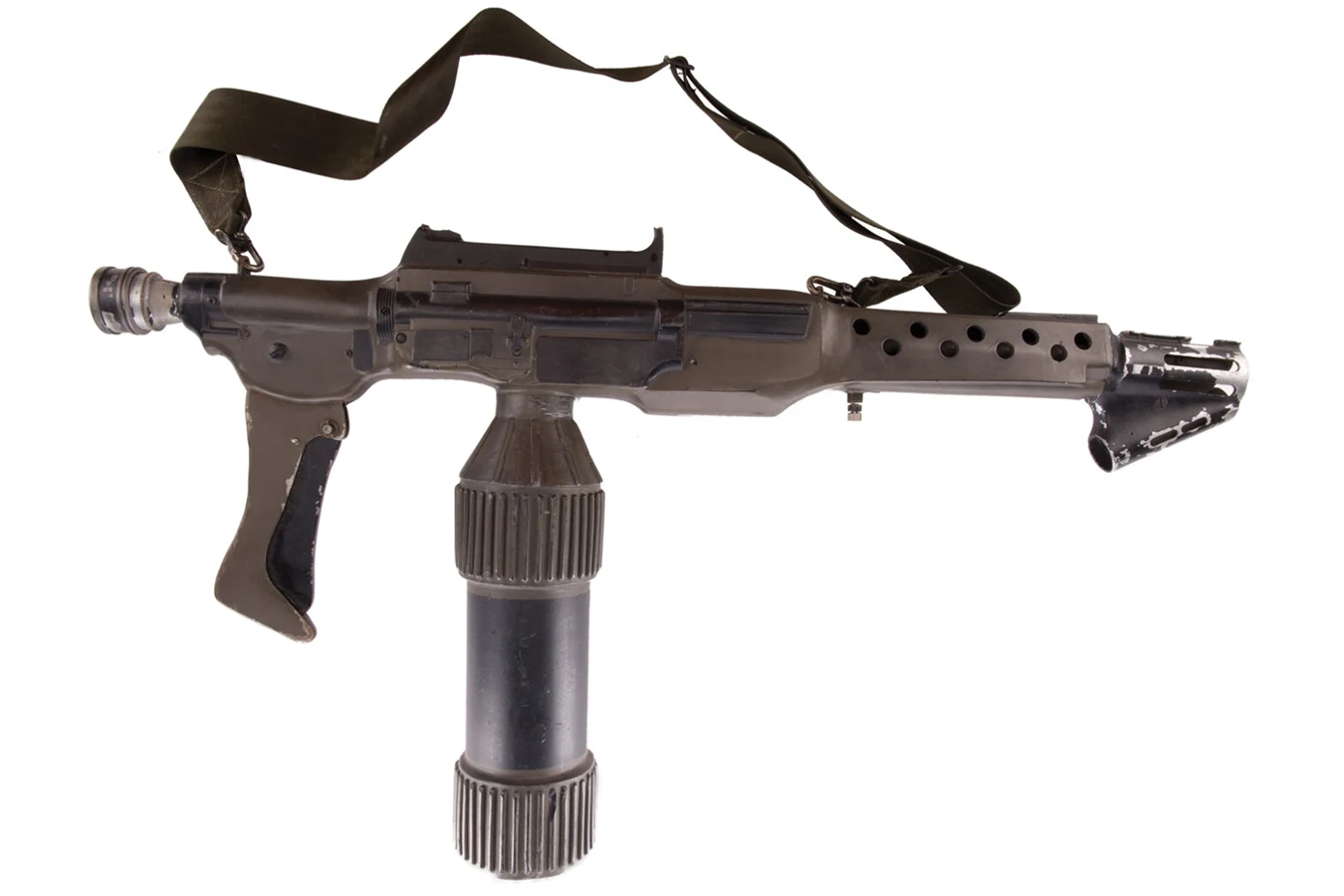 Studio side view of an Aliens M240 flamethrower prop with underslung fuel tank and nylon sling