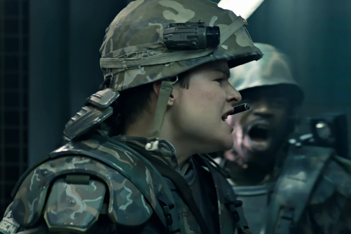 A Colonial Marine in an M10 ballistic helmet with a side-mounted tactical camera during the Hadley's Hope mission in Aliens